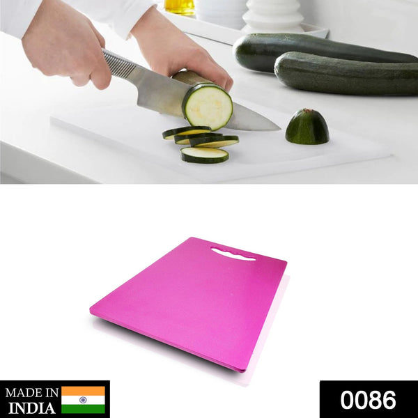 Kitchen chopping board made from plastic, suitable for various food prep tasks.