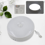 LED light with motion sensor, round shape, 8 LEDs, energy-efficient.