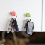 Wall clip hanger for keys with hand shape design