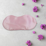 Blindfold sleep mask, satin, blocks light, ideal for meditation and travel.