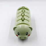 Pig mold ice candy maker set for creating popsicles and kulfi.