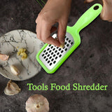 Kitchen grater with durable plastic body and handle