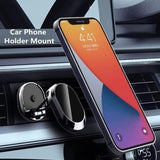 Compact metal car phone holder.