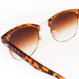 Retro style driving sunglasses with a vintage frame.