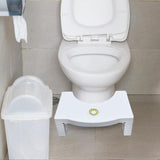 White toilet squat stool, easy to fold and non-slip for safe use.