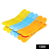 Durable plastic double pin clips in assorted colors for clothes.