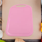 Small cutting board for meat and vegetables.