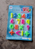 Educational toy with magnetic numbers for interactive play.