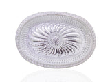 Oval silver serving tray with royal design for upscale presentation.