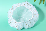 Reusable waterproof shower cap for all head sizes.