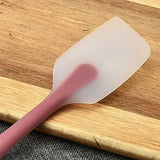 Close-up of the silicone spatula, highlighting its non-stick surface and color variety