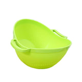 Multipurpose strainer bowl with handle for fruits and vegetables.