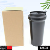 Vacuum insulated coffee cup with leak-proof lid for travel.